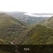 camino duro, met wolken onder ons