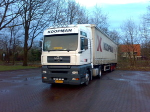 Met witte Zonneklep en Koopman