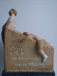 DE BEKLIMMING VAN DE MUUR