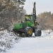 boomzaag machine rond de vers overloonseduinen  te overloon