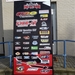 Bord met de sponsors van het team