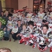 Groepsfoto van het team met de dames