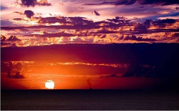 onder, zon en wolken