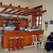 76Cyprus - Omodos bar met priester
