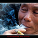 Smoking man, at the hilltribes in Chiang Rai.