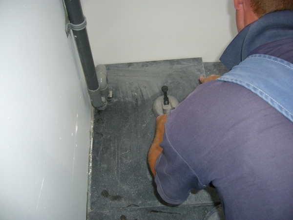 De laatse tegel van de 156 vierkante meter.