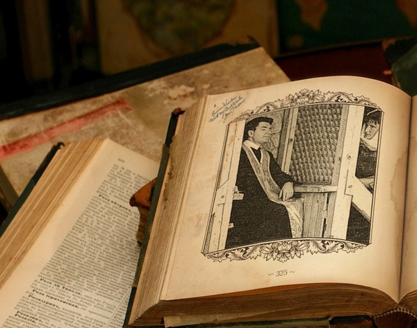 Biddend in boek