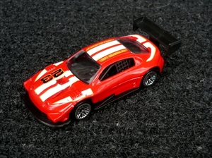 HotWheels_ToyotaCelicaPikesPeak_RedwWhiteStripeswYellowHotWheelsO