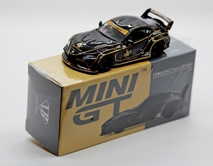 IMG_2533_Mini-GT_LB-Works-Toyota-GR-Supra_JPS_zwart&goud_RHD_MGT0