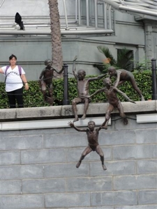 boys playing in Singapore river