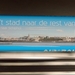 2015.11.17 'KLM'-reclame op rubberen band roltrap_3