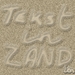 les 269 tekst in zand