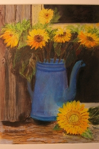 zonnebloem in koffiekan