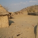 11. Kraal met hutjes van de Himba's