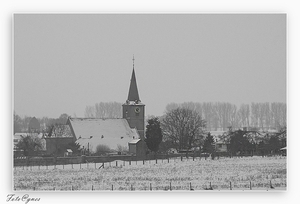 onze kerk van Everbeek beneden vanuit het veld  gezien