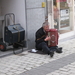 03) Een straatmuzikant met zijn accordion