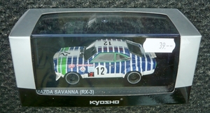 Kyosho_1op43_Mazda_RX3-Savanna_wit-blauw-groen-zebra_No12-1971_ro