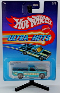 IMG_3706_HotWheels_Mazda-repu_Spectraflame-aqua_black stripes&wit
