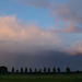 Regen wolk met regenboog