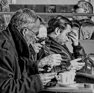 Three men and a coffee table