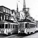 Stationsweg . Twee versierde trams , op Koninginnedag 1955..links