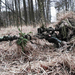 foto-van-een-soldaat-in-camouflage-kleding-en-met-een-sniper-rifl