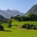 Switzerland-mountains-Alps-valley-grass-road-house-trees_1600x900