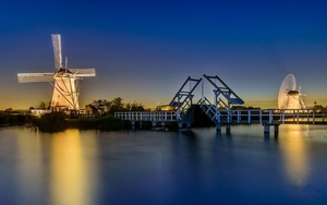 Netherlands-lights-windmill-river-bridge-night_1680x1050