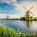 Netherlands-river-windmill-grass-beautiful-scenery_1680x1050