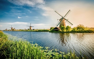 Netherlands-river-windmill-grass-beautiful-scenery_1680x1050