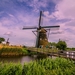 Netherlands-windmill-bridge-river-grass-clouds_1280x800