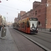 Amsterdam-Damrak. Een begin van Hybride trams Met bovenleiding of