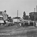 Halfweg Een ansichtkaart uit 1957 toont het Dr. Baumannplein met 