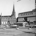 1966. Damplein gezien naar de Damstraat, geheel links de R.K. bib