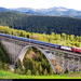 trein-boogbrug-brug-bergen-achtergrond