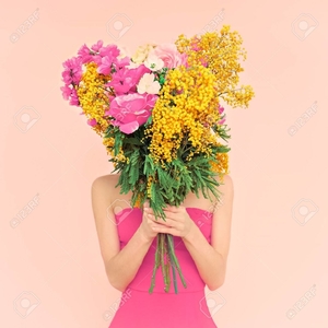 36743219-girl-with-bouquet-of-flowers-in-her-hands-flowers-spring