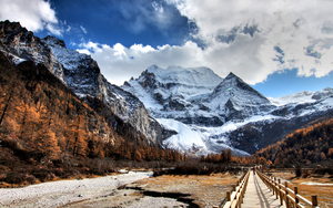 420577-snowy-mountains-wallpaper-1920x1200-windows