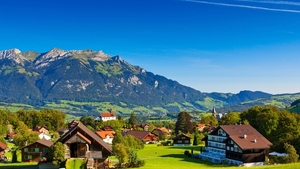 Switzerland-Alps-mountains-summer-nature-greenery-houses_2560x144