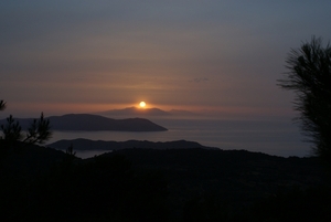 Zonsondergang boven Tylos