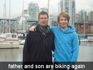 father and son are biking and again