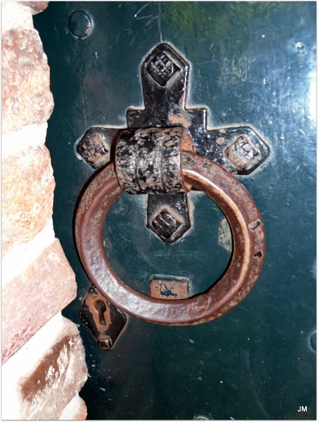 Oude deurklink van de kerk in Anloo