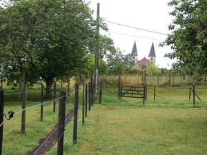 064-Dubbele torens St-Pieter en Pauwelskerk in Neerijse