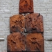 16-Relifs aan kerkmuur in terracotta