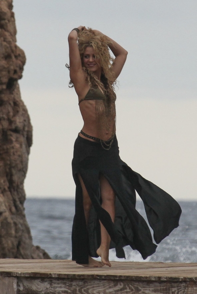 Shakira - wearing a bikini top on the set of a commercial in Spai