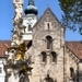 5  Heiligenkreuz _abdijkerk met pestzuil op voorgrond