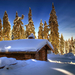 winter-wallpaper-met-een-houten-hut-in-de-sneeuw-met-bomen-op-de-
