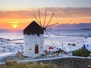 windmill-at-sunset-mykonos-greece_626795320
