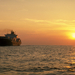 Container_ship_at_sunset
