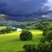 cloudy-sky-green-grass-nature-landscape-et9rid