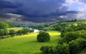 cloudy-sky-green-grass-nature-landscape-et9rid